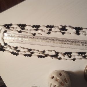 Triple strand of white and black beads